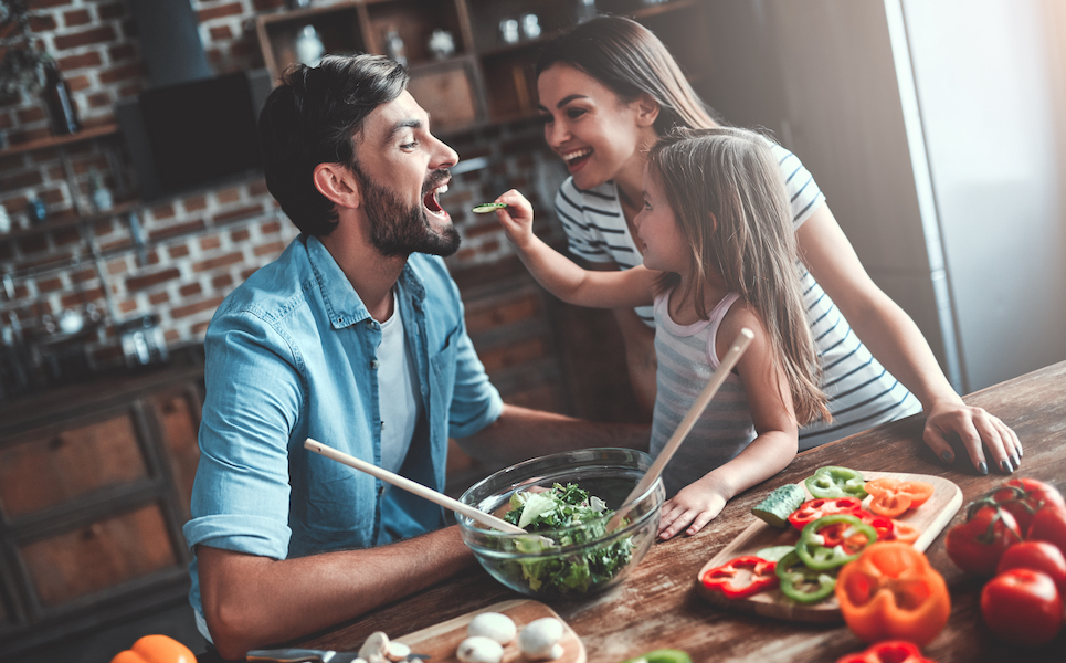 Happy family healthy cooking